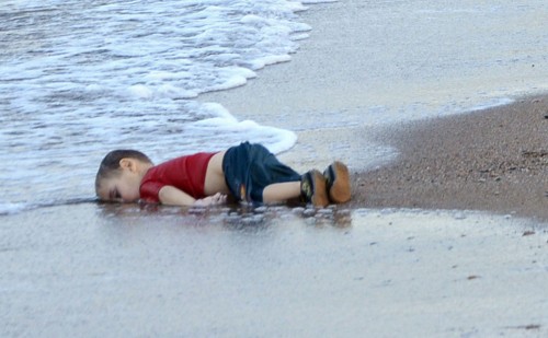 The body of Aylan Kurdi, aged 3, washes up on the beach of a Turkish resort.