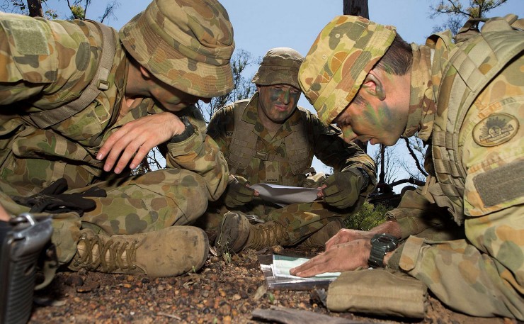 Australian Army soldiers Trooper Moses Duffy (left), Trooper James Rowbottom (centre) and Trooper Ben Zeid from A Squadron, 10th Light Horse Regiment, take part in the navigation theory section of Exercise Retimo, 13th Brigade's annual military skills competition, at Bindoon military training area in Western Australia. (IMAGE: ABIS Chris Beerens, Navy Imagery Unit - West)