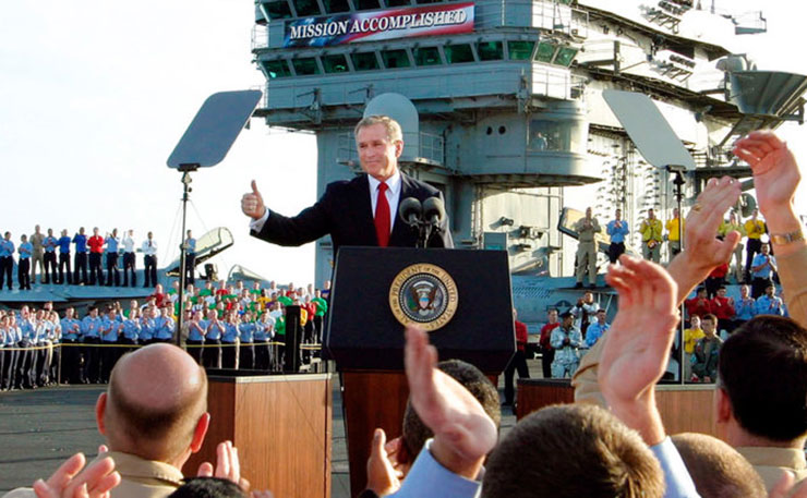 Former US president George W Bush declares 'victory' in the illegal war against Iraq. (IMAGE: Peter Stevens, Flickr).