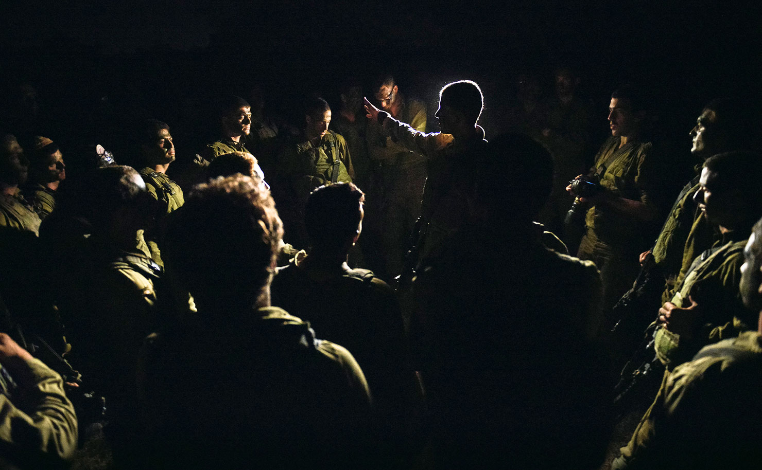Israeli Defence Force soldiers prepare to enter Gaza during Operation Protective Edge in 2014, an assault which killed more than 2,200 Palestinians - most of them civilians - and 66 Israeli soldiers, plus six Israeli civilians. (IMAGE: IDF, Flickr)