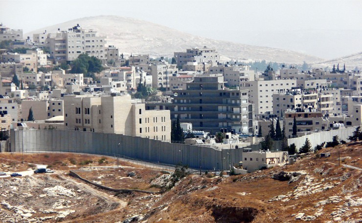 The wall built by Israel, which has been the scene of numerous deaths. (IMAGE Bradley Howard, Flickr).