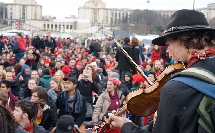 More than 10,000 protestors turned out in Paris, in defiance of bans against political gatherings, to express their disgust at the outcome of the COP21 talks. (IMAGE: Thom Mitchell, New Matilda)