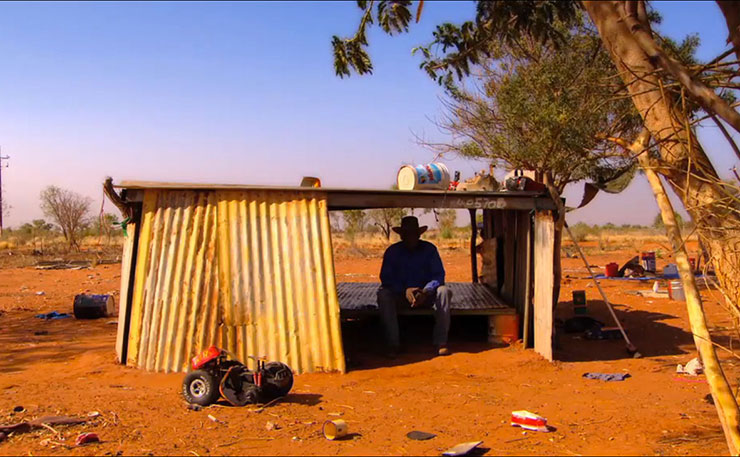 A scene from Utopia, the documentary produced by John Pilger. The scene is from a small Aboriginal called Irrultja, in the Utopia homelands.
