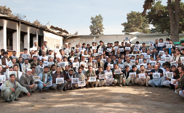 From the grounds of the bombed hospital, the MSF staff in Kunduz sent their deep appreciation to everyone around the world who stood in solidarity with them. Three weeks after the event this is the first time they've see each other again. (IMAGE: Medecins Sans Frontieres)