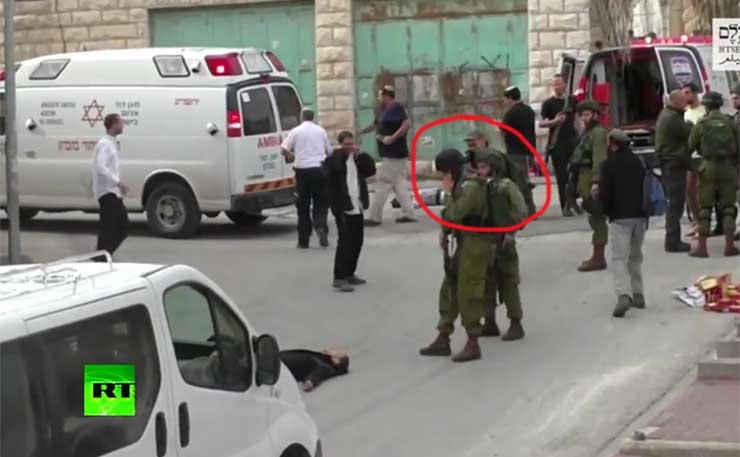 Israeli soldier Elor Azaria cocks his rifle, shortly before shooting dead an injured Palestinian man lying wounded in the streets of Hebron.