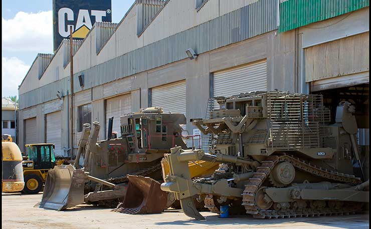 IDF D9 bulldozers made by CAT for the Israeli Defence Force. They're used to demolish the homes of Palestinians. (IMAGE: Zachi Evenor, Flickr)