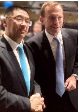 Former Prime Minister Tony Abbott, pictured with Minshen Zhu.