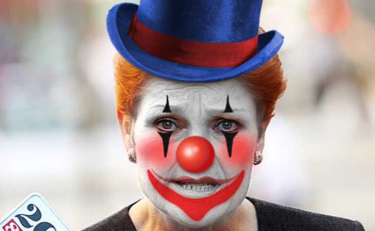 Creepy clown Pauline Hanson, setting off her flame red clown hair with an impressive blue hat.