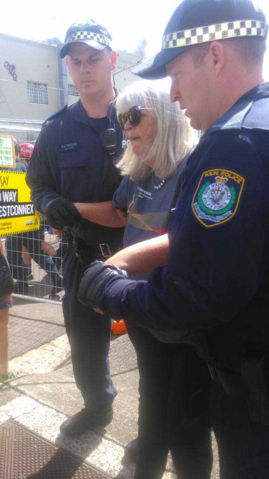 New Matilda contributing editor Wendy Bacon, being arrested recently during protests in Sydney against the Westconnex project.