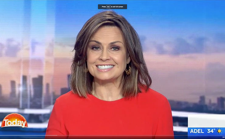 Today Show presenter Lisa Wilkinson, smiling as she details 'tense scenes' when the partner of a shooting victim arrives at a Melbourne home.
