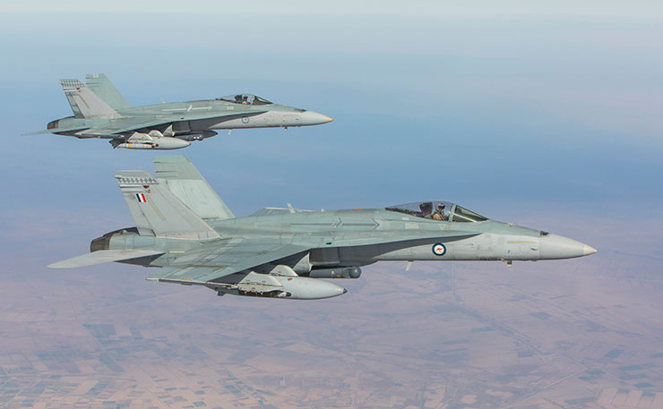 Number 75 Squadron F/A-18A aircraft refuelling from a Royal Australian Air Force KC-30A Multi Role Tanker Transport aircraft, in support of Iraq Security Forces in the battle for Mosul, during the Squadron’s deployment in 2016. (IMAGE: Department of Defence)