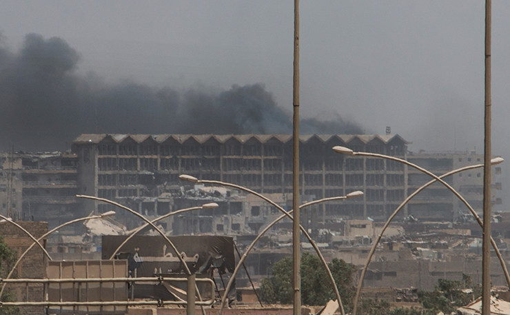 Mosul’s general hospital under heavy rocket and small arms fire on June 14. At the moment, at least 100,000 people remain trapped by the fighting, which is taking place in densely populated areas where ISIS fighters mix with the civilian population. (IMAGE: ©EU/ECHO/Peter Biro, Flickr)