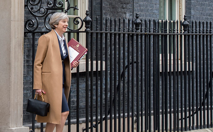 British Prime Minister Theresa May exits 'Number 10 Downing Street', March 2017. (IMAGE: Number 10, Flickr)