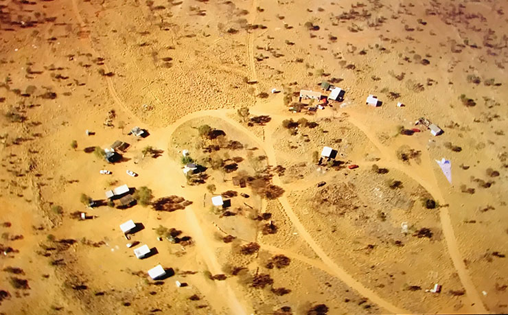 An aerial image of the Alice Springs town camp Whitegate, which has long been denied basic services such as water. The image is from John Pilger's film, Utopia.