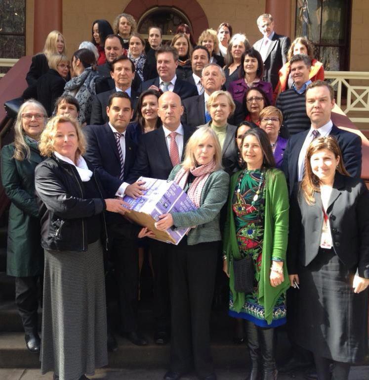 Campaign group Save our Women's Services delivered almost 14,000 signatures to the NSW Parliament last year in protest of the changes to service providers in women's refuges around the state. Photo: SOS.