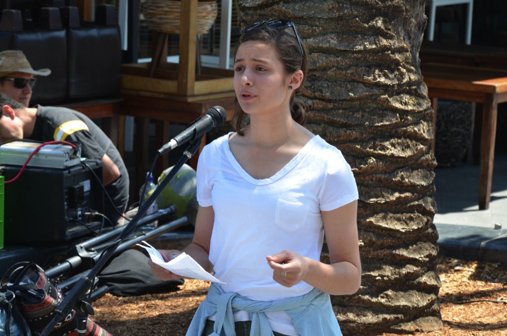 High school student Wafa Kazal speaking to the crowd at the pro-refugee rally in Cronulla. Photo by Paul Carson.