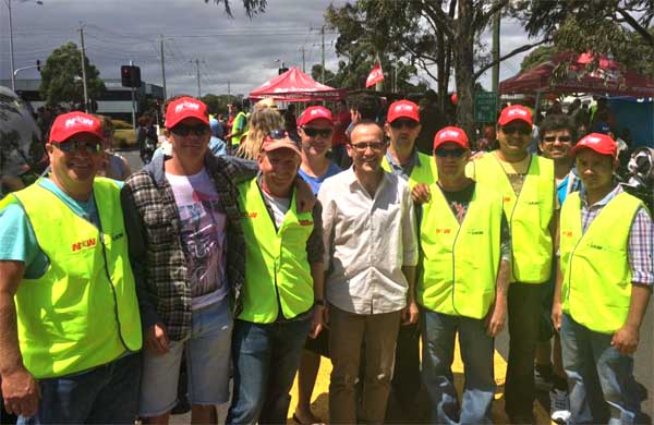 Greens Member for Melbourne, Adam Bandt enjoys a barbecue with factory workers over the weekend.