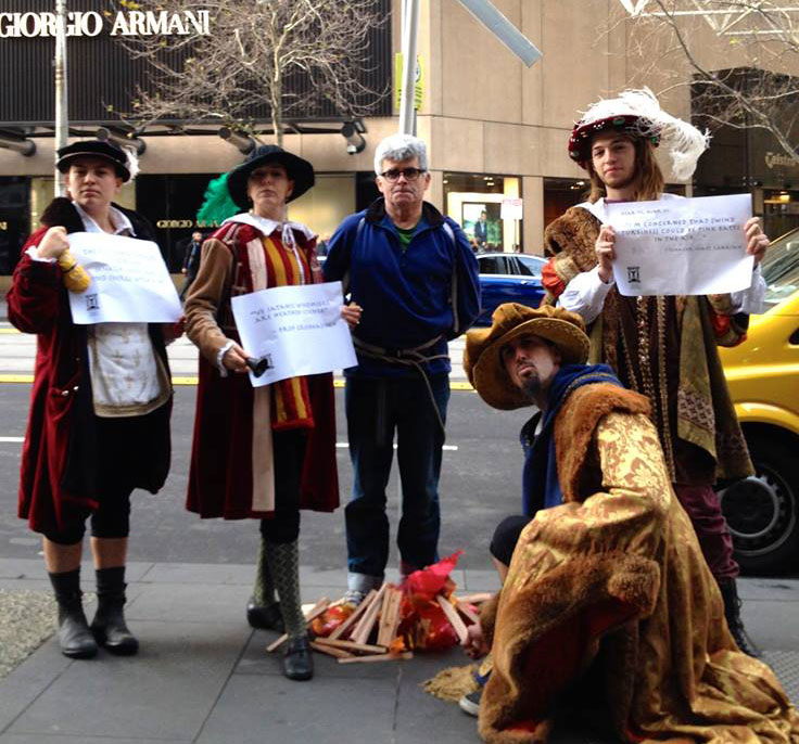 Members of the Flat Earth Institute, outside Monday's Senate Inquiry into wind farms.