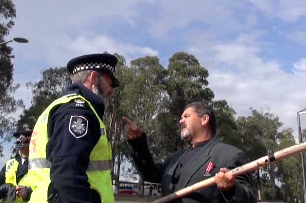 Ex-serviceman Fred Hooper, during his confrontation with the AFP over his right to march and commemorate the Frontier Wars.