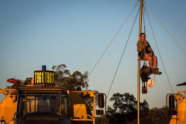 An activist on a tripod at one of the four points of the blockade on Valyama road, where workers enter the site. Protesters blocked entry to Whitehaven's controversial Maules Creek coal mine development. The mine faces massive community opposition and environmental organisations, Lock The Gate, The Wilderness Society, Greenpeace, 350 and others joined the call from locals to prevent work going ahead on the infrastructure of the mine. Image: Tom Jefferson