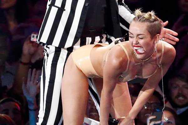 Miley Cyrus, the genius, melding music, soft pornography and self-parody.