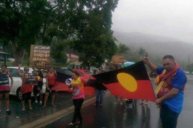 Protestors in Yarrabah, north of Cairns, brave a tropical cyclone to voice their opposition to the closure of communities in Western Australia.