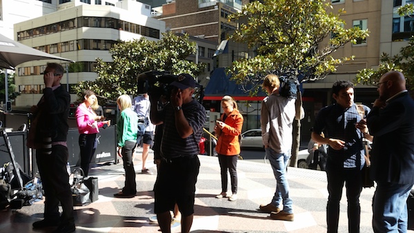 Reporters wait outside for Newman. Photo: Max Chalmers.