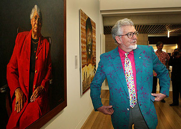 Harris at the National Portrait Gallery Opening in 2008, pictured in front of a painting of respected Aboriginal elder Lois O'Donoghue.