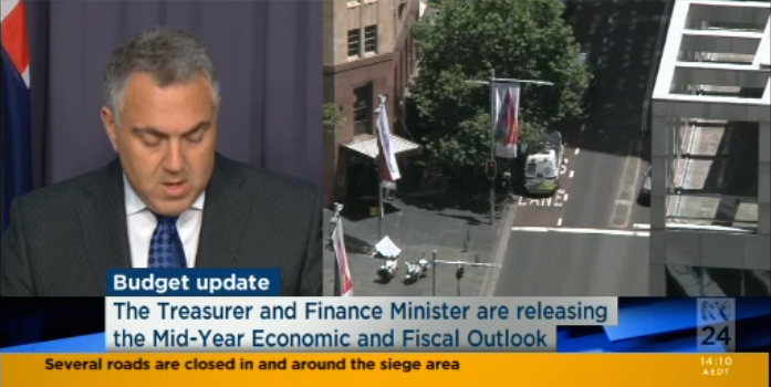 ABC carried split coverage of MYEFO as the Lindt siege continued in Sydney