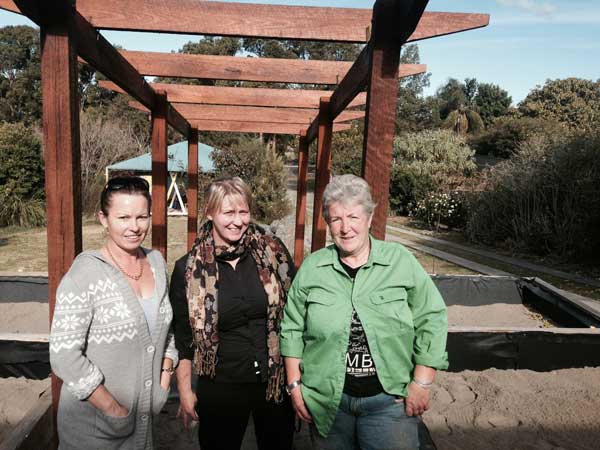 Natalie Smee, Rachel Laird and Chris Robertson pictured in the Kempsey Women's Refuge garden.