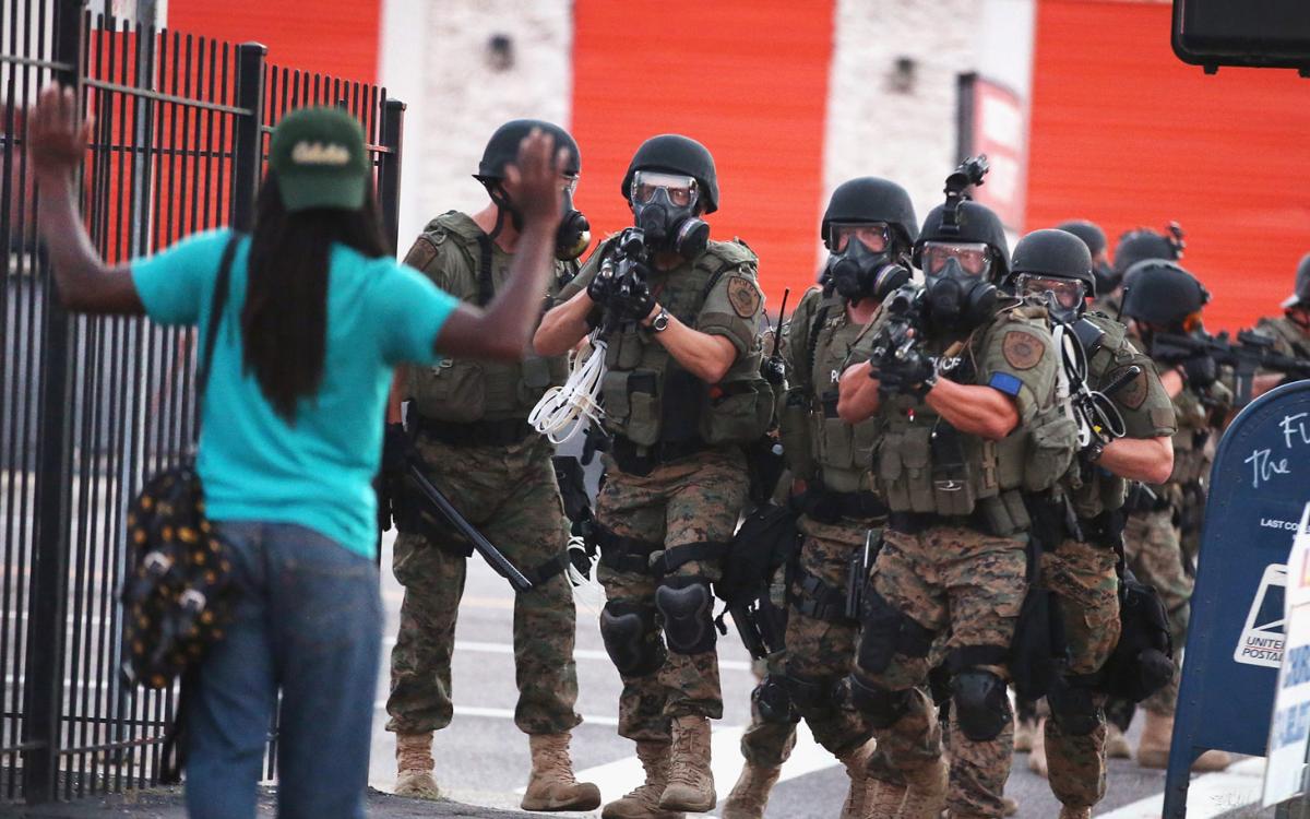 A now iconic image of the police response to anger in Ferguson after Brown's death.