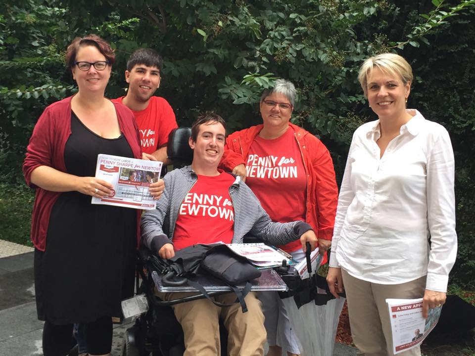 Penny Sharpe, left, is joined by volunteers, staff, and Federal MP Tanya Plibersek.