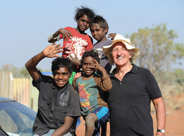 John Pilger pictured in the Utopia region, during the filming of the documentary.